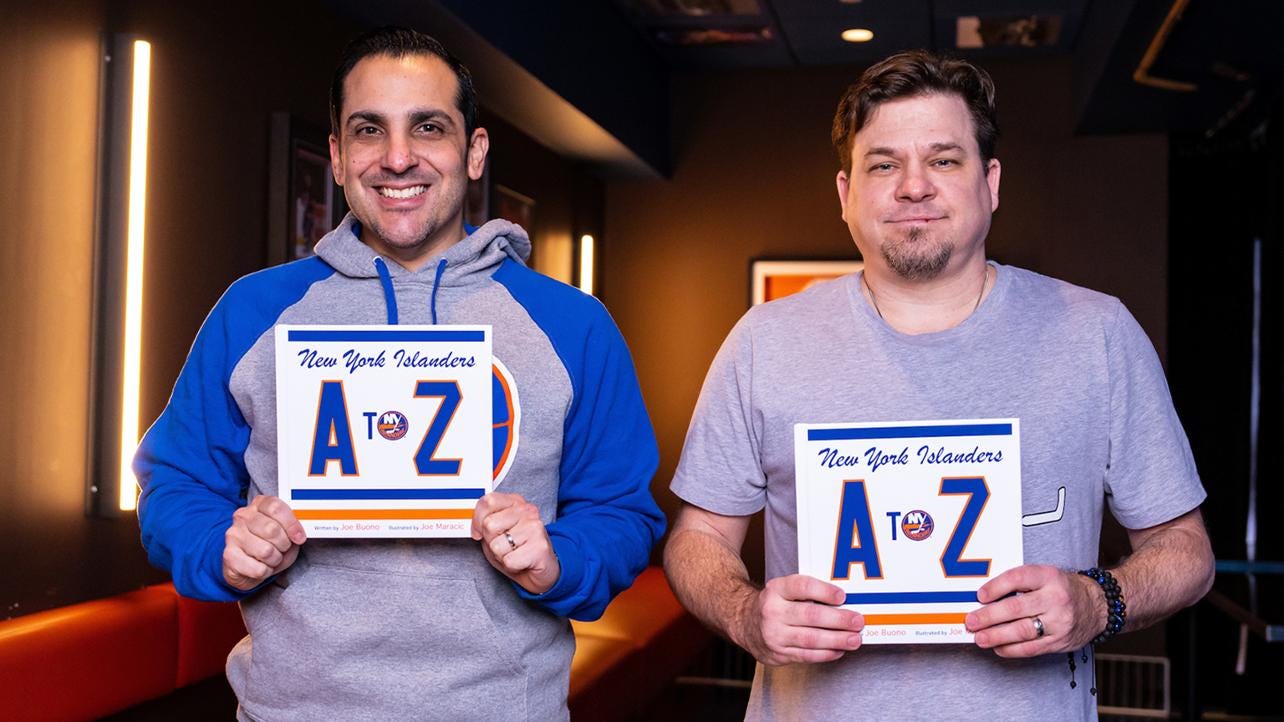 Author Joe Buono (L) and illustrator Joe Maraic (R) pose with their children's book Islanders A to Z. Author Joe Buono (L) and illustrator Joe Maraic (R) pose with their children's book Islanders A to Z.