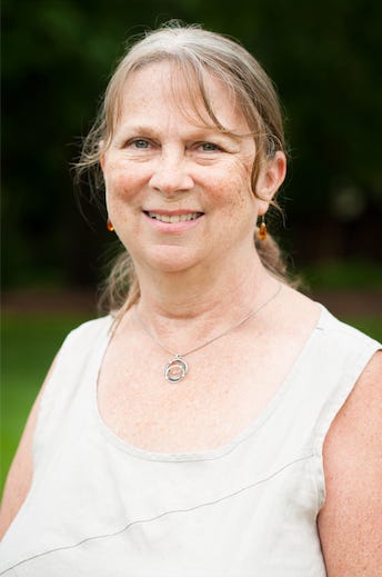 Susie Hamrick Jones wearing an off-white sleeveless shirt