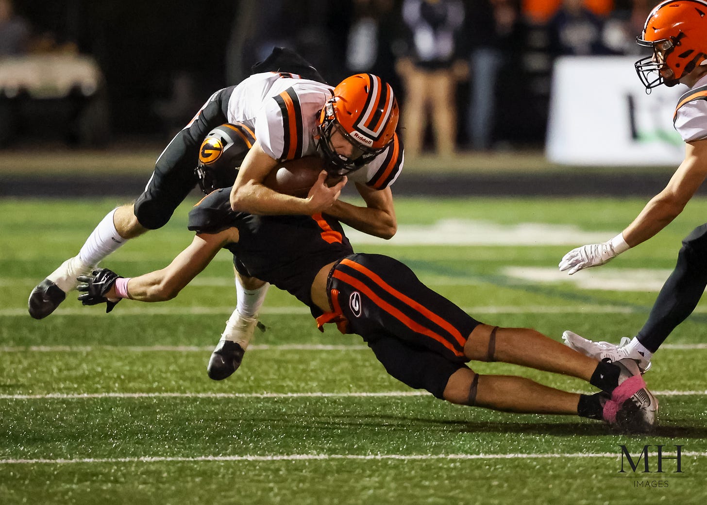 May be an image of 2 people, people playing football and text