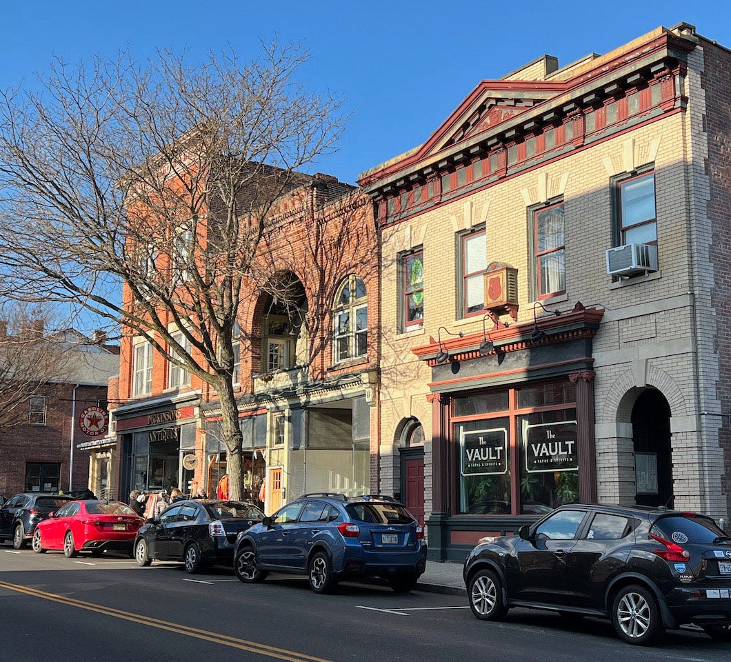 A picture containing building, road, outdoor, sky

Description automatically generated