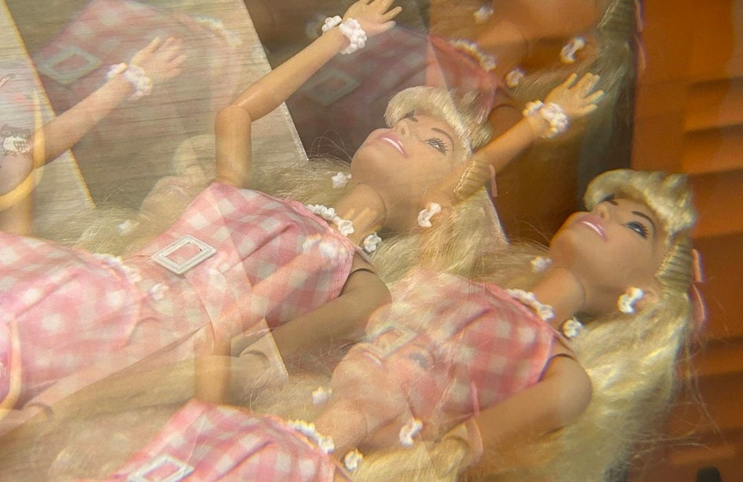 a group of mannequins dressed in pink and white a group of mannequins dressed in pink and white