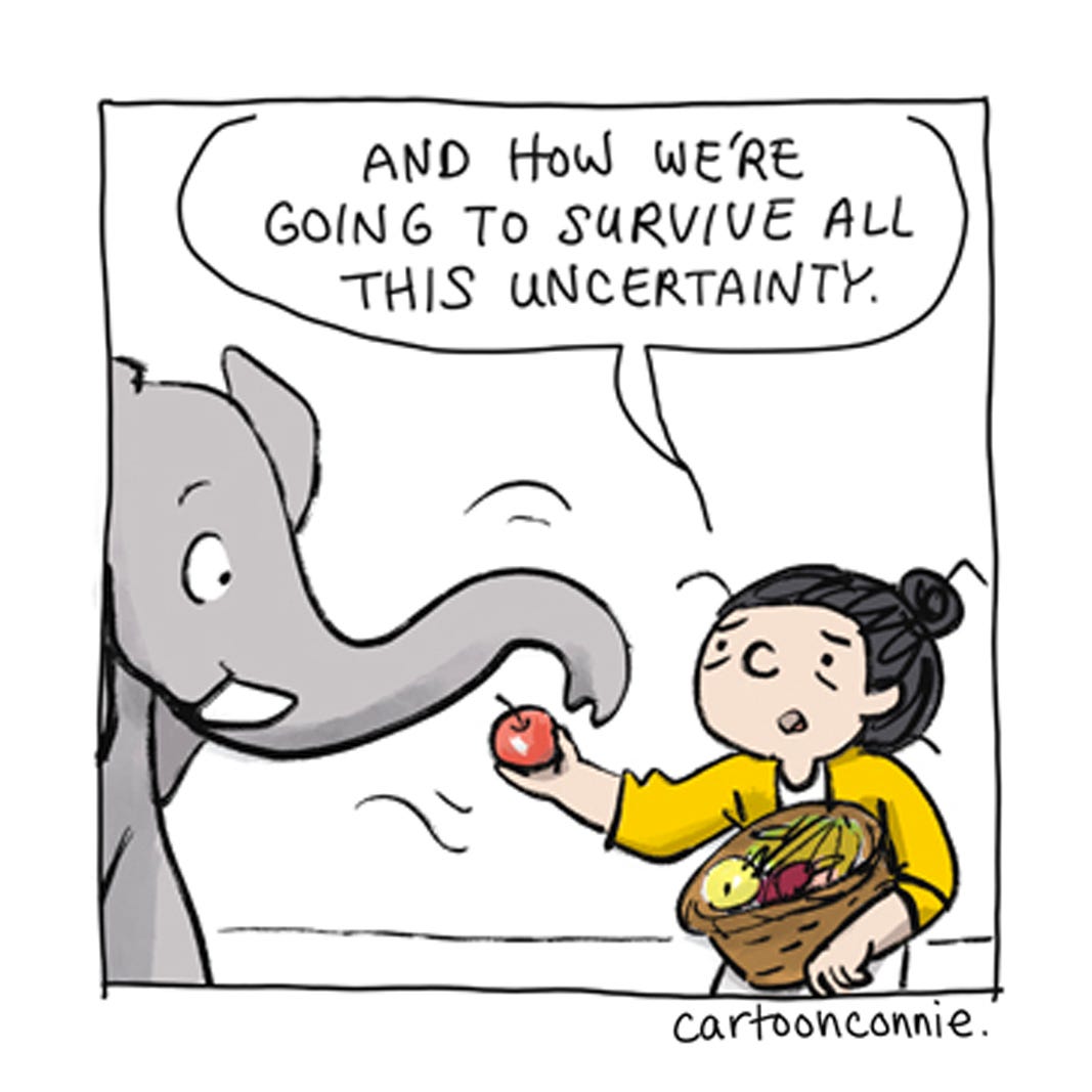 Panel 2 of a 6-panel comic about the weird things we stock up on in times of uncertainty and scarcity. The panels illustrate a cartoon girl with a bun talking to an elephant about insecurity leading to an impulse to panic-buy strange things. Titled "The Things We Stock Up On," 2026, by Connie Sun, cartoonconnie. Panel 2 of a 6-panel comic about the weird things we stock up on in times of uncertainty and scarcity. The panels illustrate a cartoon girl with a bun talking to an elephant about insecurity leading to an impulse to panic-buy strange things. Titled "The Things We Stock Up On," 2026, by Connie Sun, cartoonconnie.