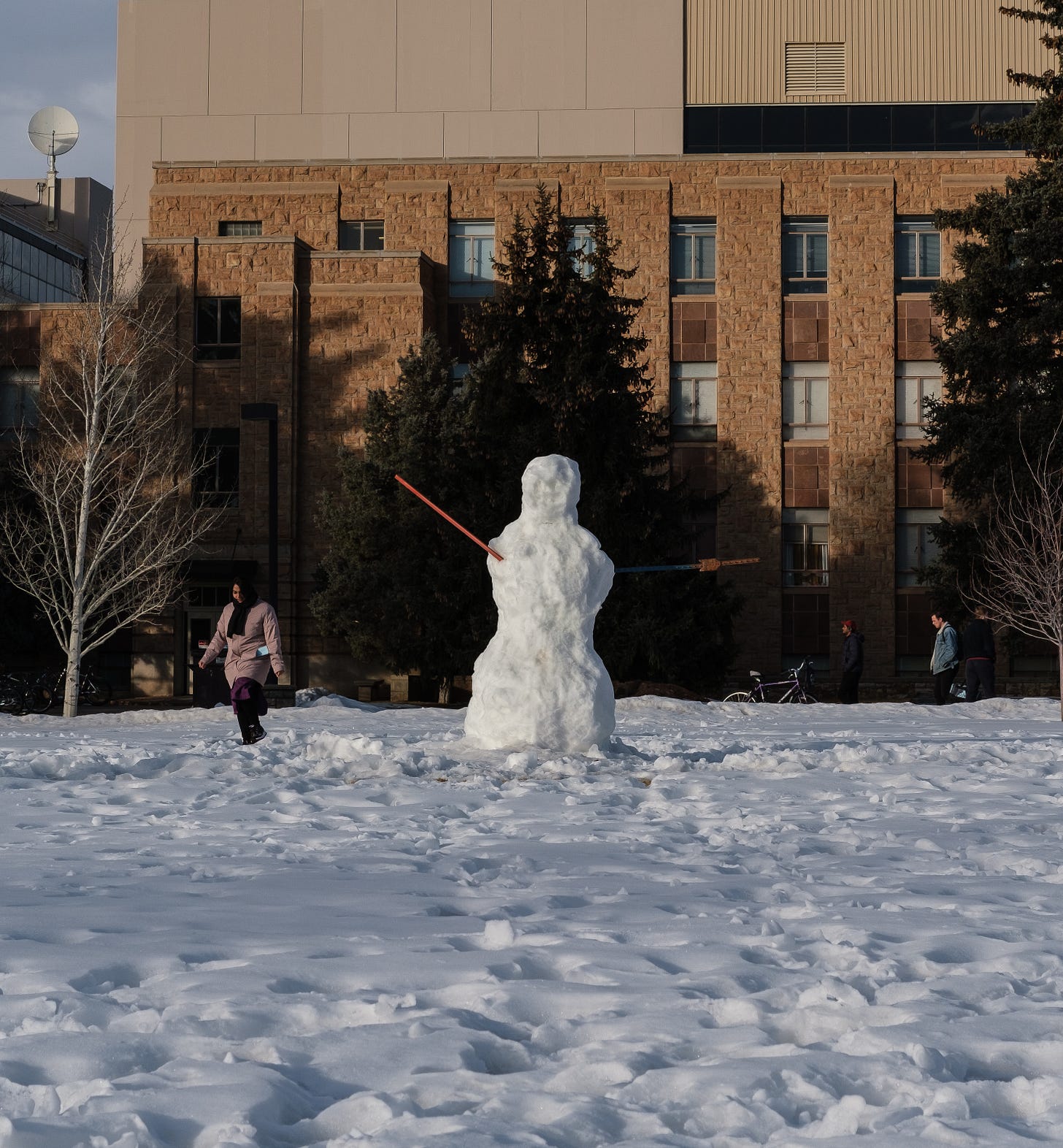 Students walk past Prexy’s Pasture on the first day of the spring semester.