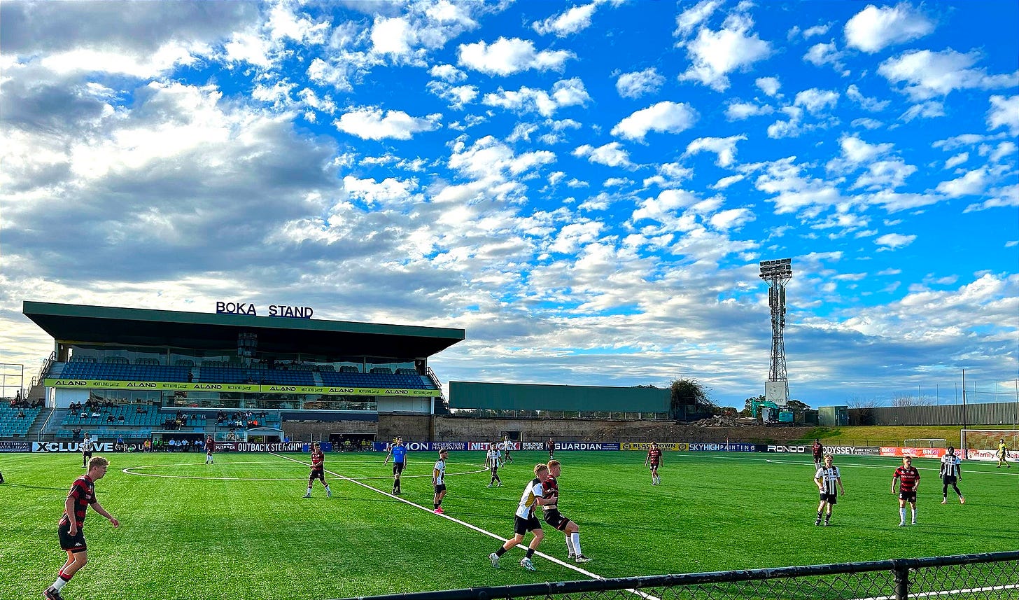 Match scene at sydney united sports centre with the main Boka (sponsored) stand in the background