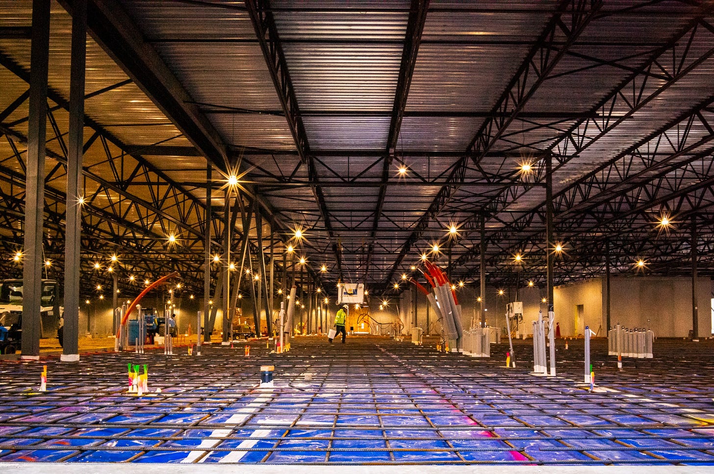 May be an image of lighting and oil refinery