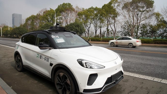 Robotaxis in China freeze on highway, leave passengers trapped inside for  hours - India Today