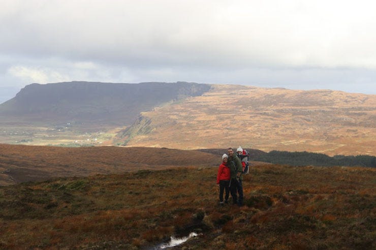 Family exercising right to roam. Isle of Eigg, Scotland.