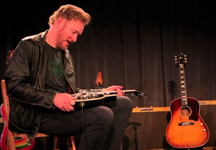 Watch Conan O'Brien geek out over George Harrison's guitar