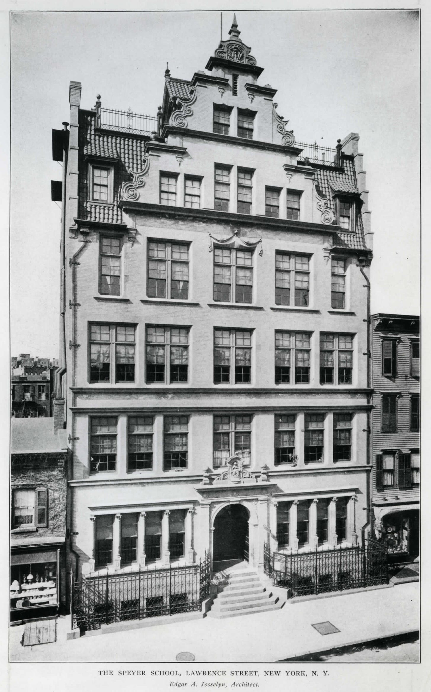 A seven-story German Renaissance style building with an elaborate facade. A caption at the bottom of the image reads, "The Speyer School, Lawrence Street, New York, N.Y., Edgar A. Josselyn, Architect."