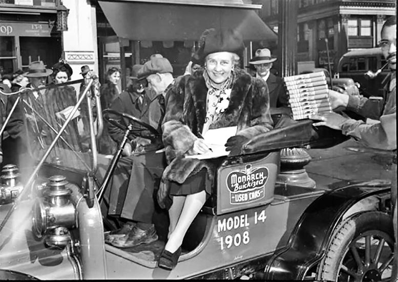 Jane Fisher in 1947 signing her book ‘The Fabulous Hoosier”. Courtesy of June Thompson Morris.