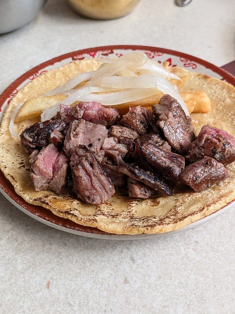 Tacos, quesidilla, and tres leches cake at La Once Mil in Mexico City