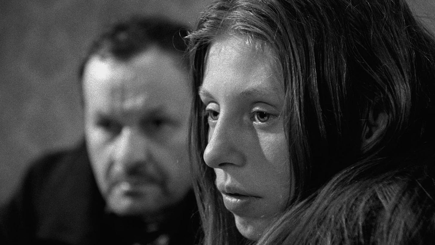 Maloin (Miroslav Krobot) and his daughter Henriette (Erika Bók), both looking troubled.