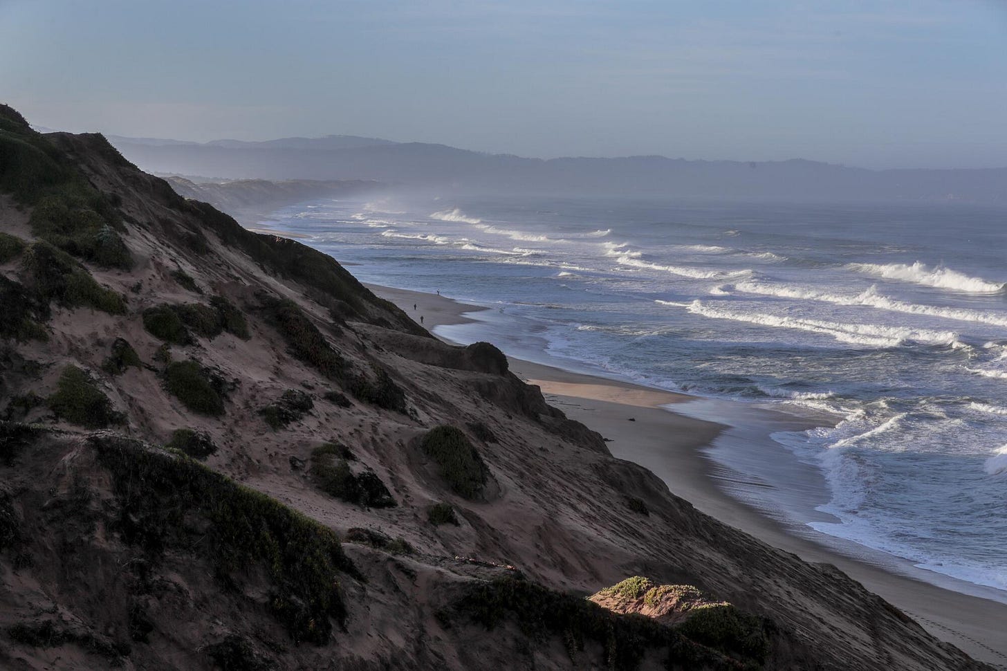 Sea level rise and coastal erosion threaten the beaches and natural sand dunes in Marina, Calif.