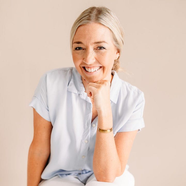 Author dressed professionally, fist under chin. Author selfie in the mountains. Both smiling.