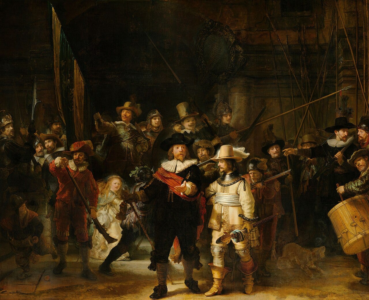 Rembrandt's The Night Watch, a large group portrait of a militia company in motion Rembrandt's The Night Watch, a large group portrait of a militia company in motion