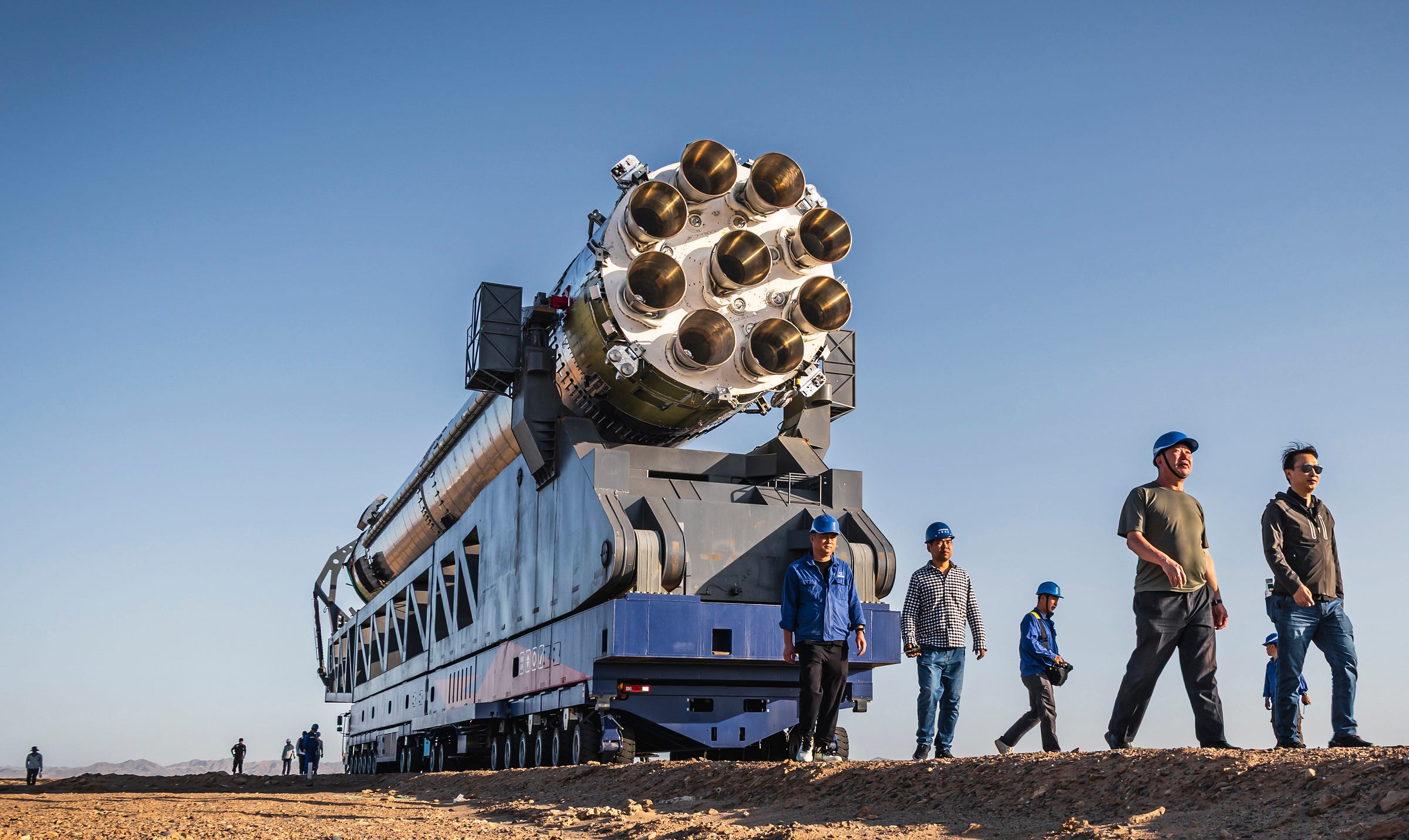 Zhuque-3’s first-stage booster test article rolling out to Launch Area 96B for its static fire in June 2025. Zhuque-3’s first-stage booster test article rolling out to Launch Area 96B for its static fire in June 2025.