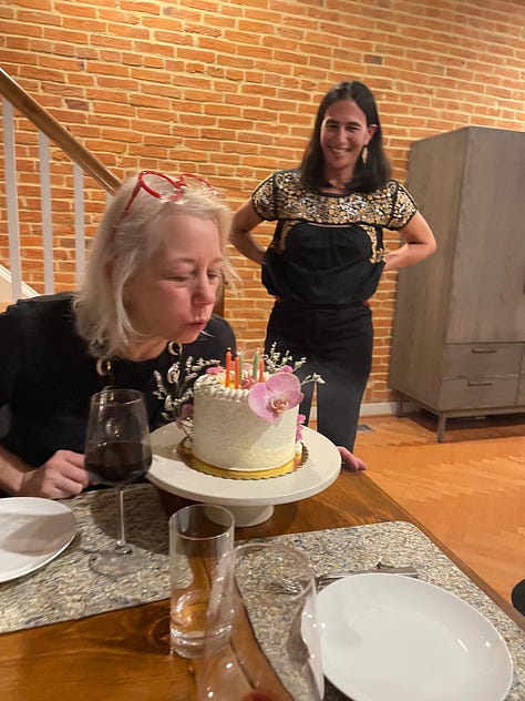 Photos of cakes, jewelry, flowers, Laura Lippman in a sweater dress, and a woman blowing out candles.