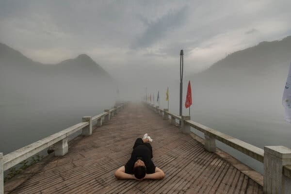 Luo Huazhong, who popularized the idea of adopting a more relaxed approach to life, taking a break in Jiande, China.