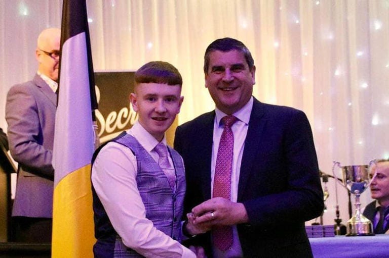 Tiernan Grennan pictured with Offaly GAA chairman Michael Duignan