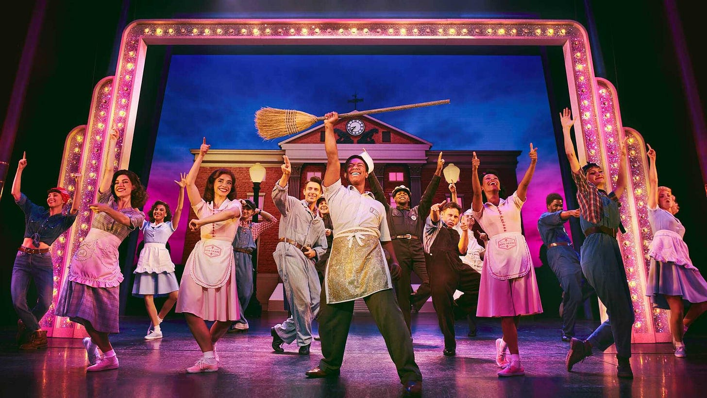 C.J. Borger as Goldie Wilson, and the cast of ‘Back to the Future: The Musical,’ on stage at the Adelphi Theatre.