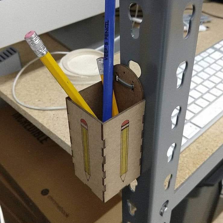 One could also add scissors, rulers, markers and other commonly needed tools to holders like this.