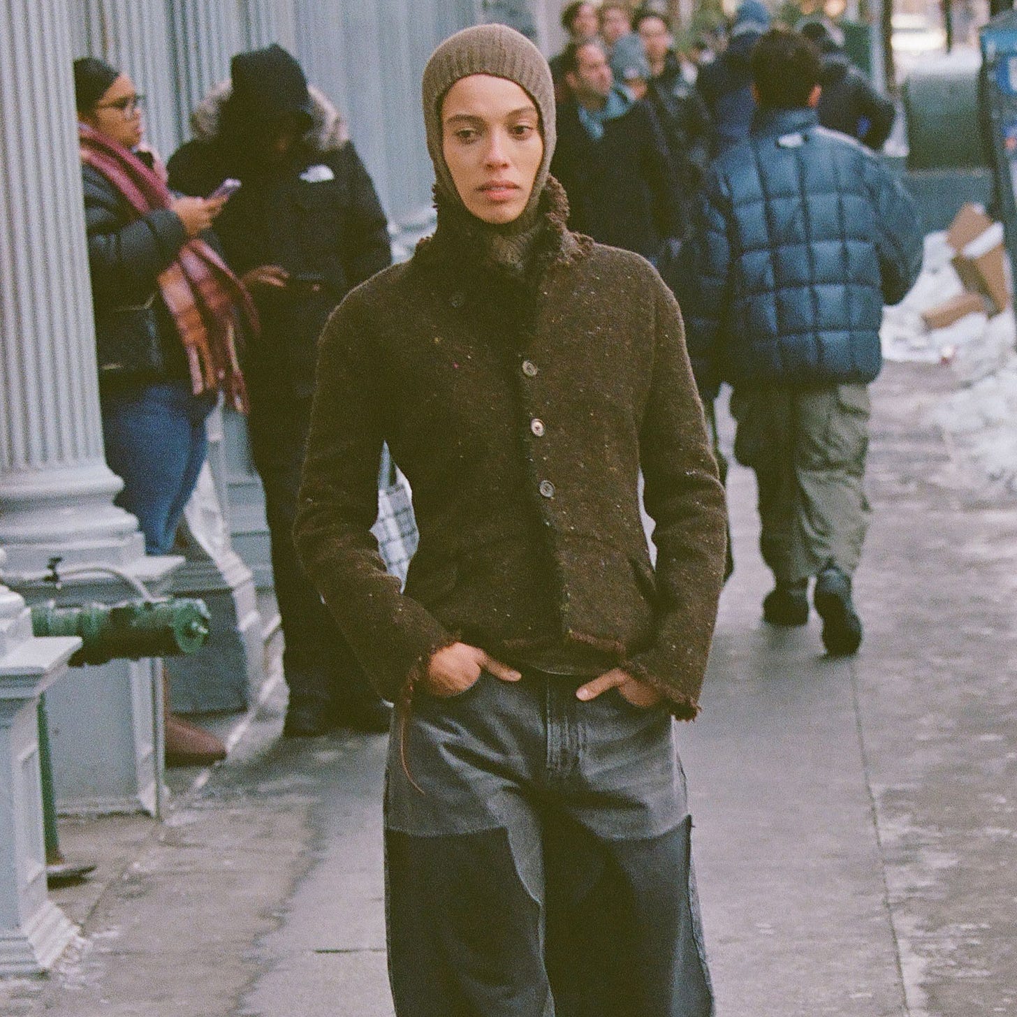 Image may contain Kristen Wilson Clothing Pants Adult Person Animal Canine Dog Mammal Pet Footwear and Shoe