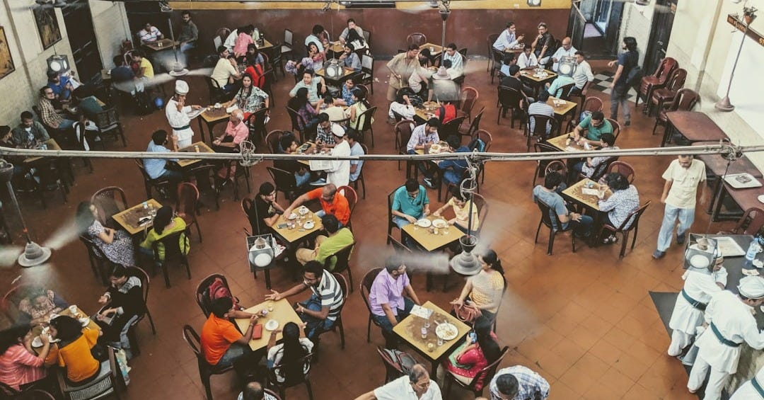 group of person eating on restaurant