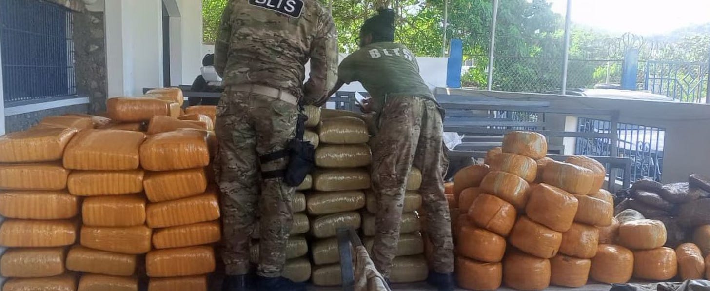 Haitian National Police Narcotics Trafficking Brigade Agents take custody of 3,200 pounds of marijuana seized in a combined US Coast Guard & US Navy operation off Mole Saint-Nicolas, Haiti.