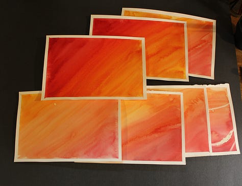 Close-up photo of three water droplets on a blade of grass with bright orange background, used for watercolor reference. | Watercolor practice sheets with variegated washes in red, orange, and yellow tones exploring blending techniques. | Watercolor painting of two large orange washes with bright water droplets reflecting rainbow colors on a green blade of grass.