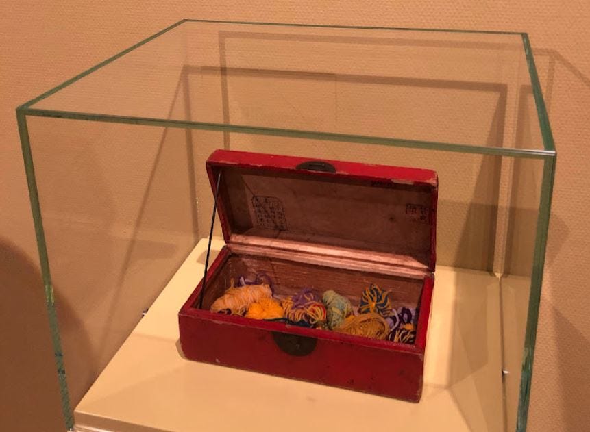 Colored yarn in red box