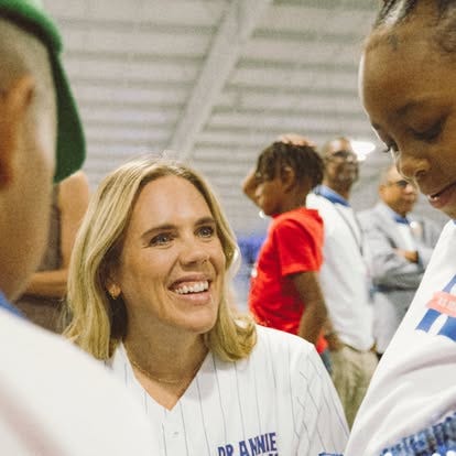 Annie Andrews M.D. talking to families in the community.