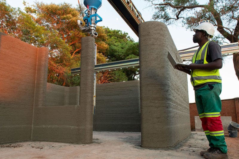 A 14 Trees 3D printed building under construction. A 14 Trees 3D printed building under construction.
