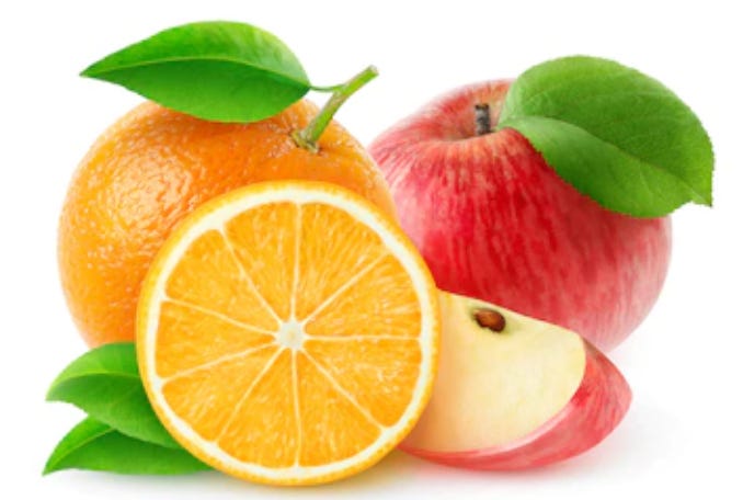 Image of one and a half orange and apple Image of one and a half orange and apple