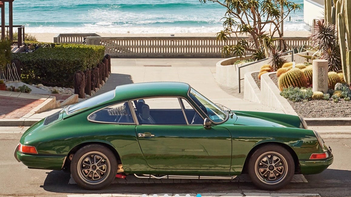 http://a 1968 porsche 911 powered by a Tesla P85 battery sits on a beautiful sunny street. http://a 1968 porsche 911 powered by a Tesla P85 battery sits on a beautiful sunny street.