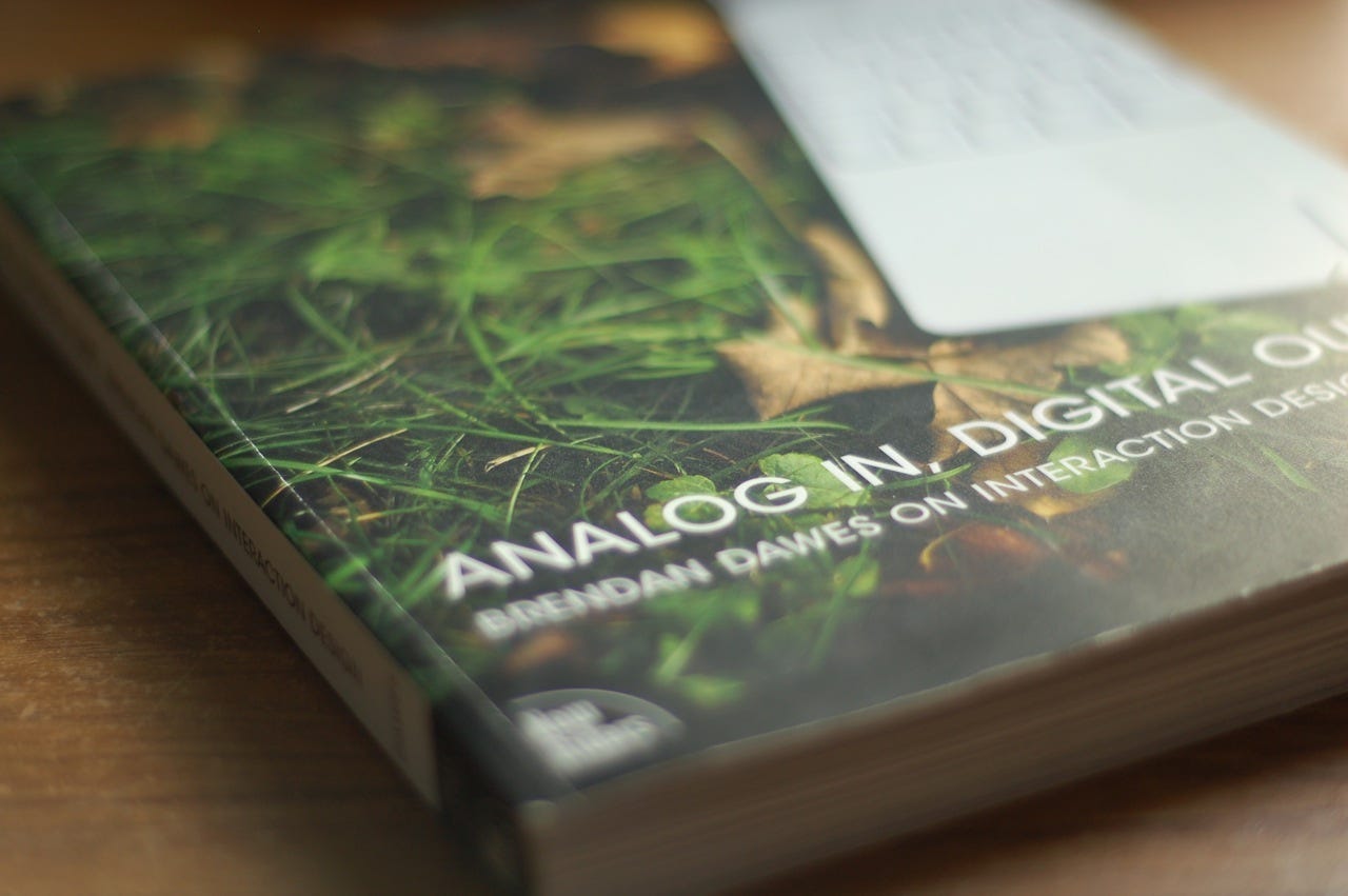 The lower left corner of a paperback book, “Analog In, Digital Out” The lower left corner of a paperback book, “Analog In, Digital Out”