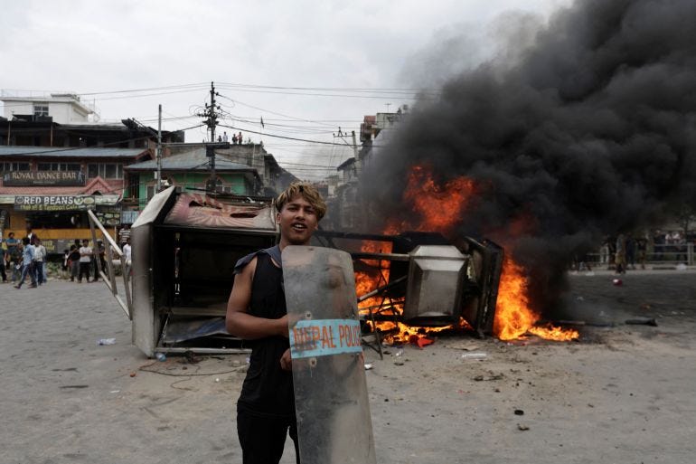 Flames outside Nepali Congress party office