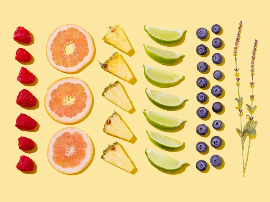 sliced fruits on white surface sliced fruits on white surface