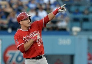 Aug 4, 2014; Los Angeles, CA, USA; Los Angeles Angels center fielder Mike Trout (27) reacts on second base after he doubled in a run in the first inning of the game Los Angeles Dodgers at Dodger Stadium. Mandatory Credit: Jayne Kamin-Oncea-USA TODAY Sports Aug 4, 2014; Los Angeles, CA, USA; Los Angeles Angels center fielder Mike Trout (27) reacts on second base after he doubled in a run in the first inning of the game Los Angeles Dodgers at Dodger Stadium. Mandatory Credit: Jayne Kamin-Oncea-USA TODAY Sports