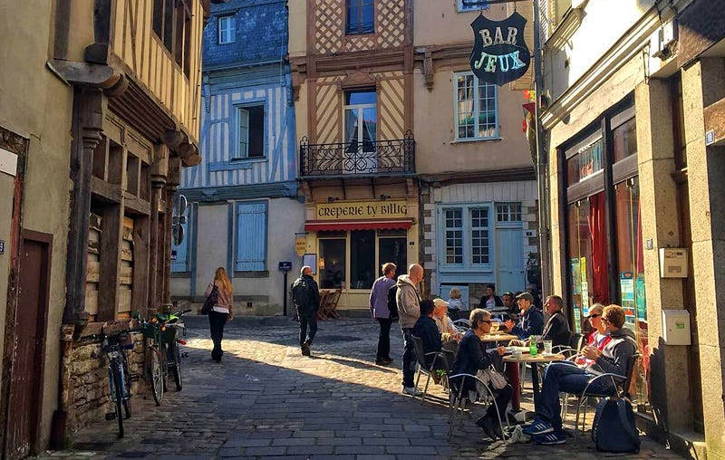 Cobbled winding street of half timbered houses in Laval, Mayenne, Normandy Cobbled winding street of half timbered houses in Laval, Mayenne, Normandy