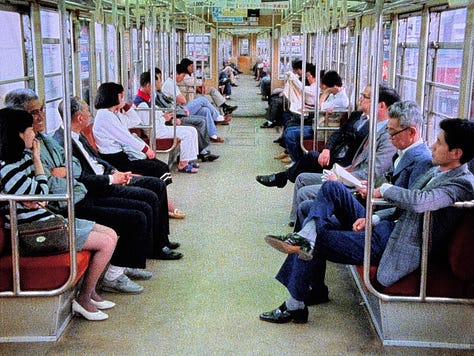 Still images from Tokyo Melody: Sakamoto playing piano, images of Tokyo subway system, street crossing, and utility workers.