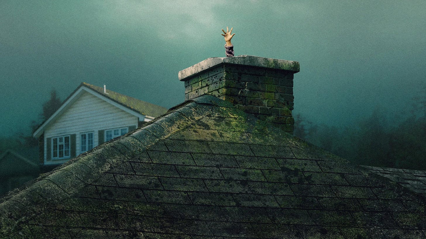 Hand sticking out of the chimney top