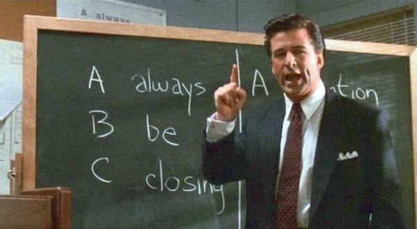 This may contain: a man standing in front of a blackboard pointing to it This may contain: a man standing in front of a blackboard pointing to it