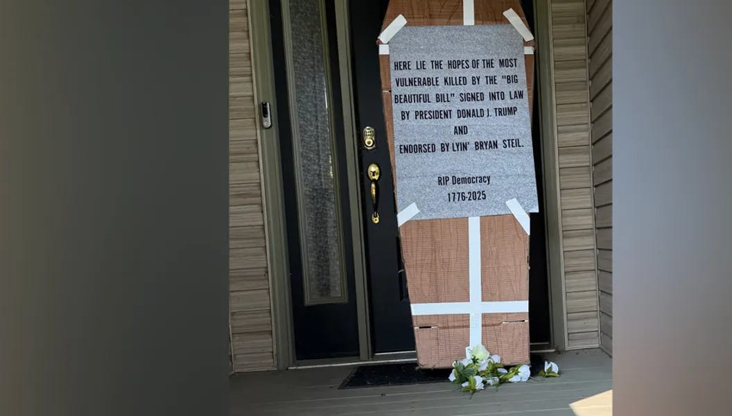 Mob Dumps Coffin at Congressman's Doorstep