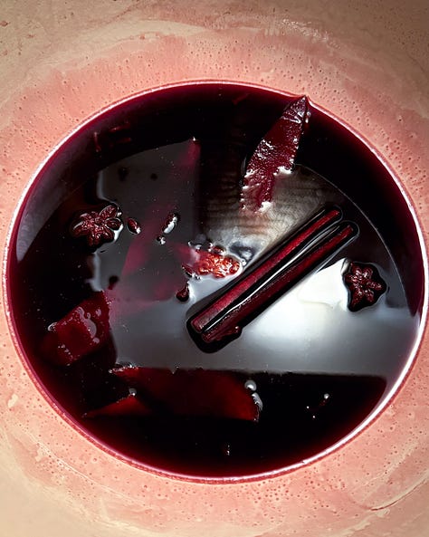 Photos of pomegranate, juniper, rosemary, chestnuts, Pine needles, blood oranges, sliced open and mulled wine simmering