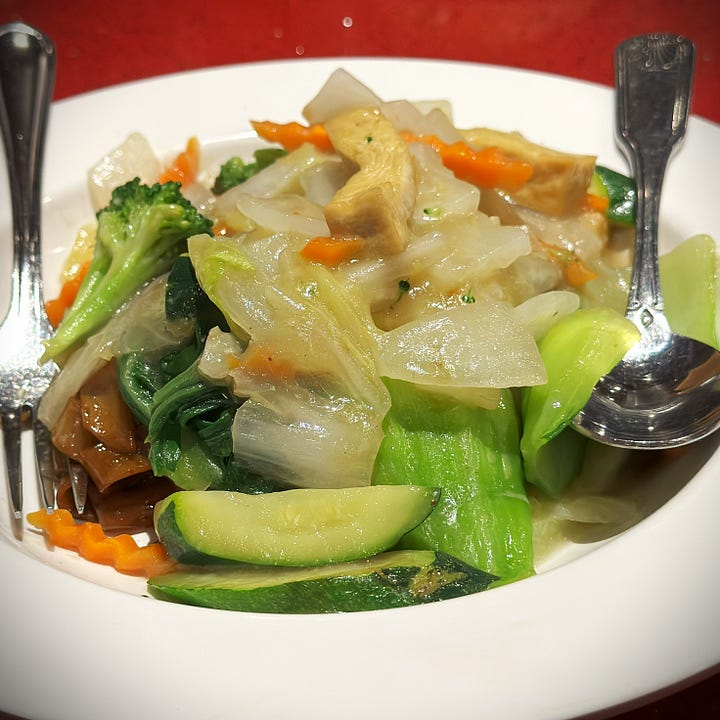 A Bowl of Vegan Chow Fun Stir Fry and Raw Curried Rice at Âu Lạc in Fountain Valley, California
