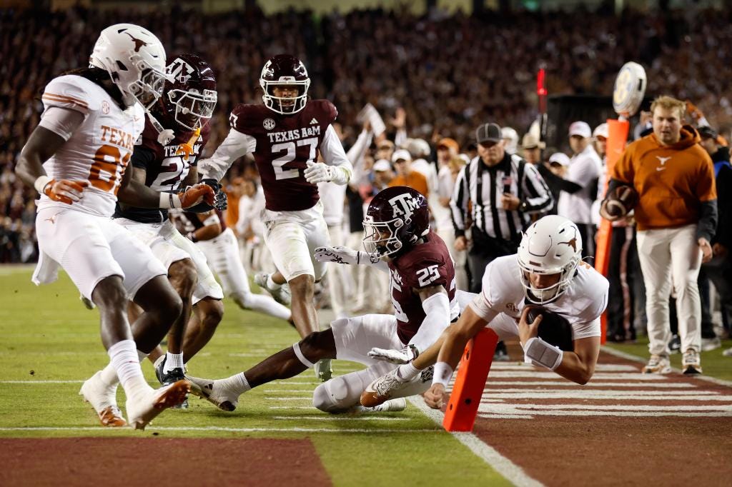 Arch Manning runs for touchdown to help propel Texas past Texas A&M
