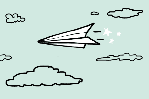 A paper airplane flying in the sky.