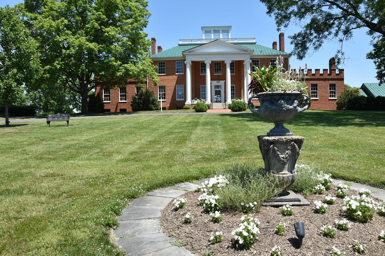 Brick house with white pillars