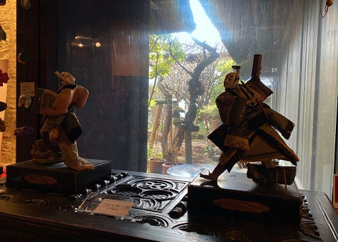 Images of traditional architecture, puppets, and archery in Kamakura, Japan.