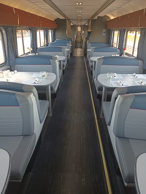 Bunn coffee maker, looking down the dining car on one train, looking down another dining car, the menu, chicken dinner on the train